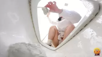 EE-775 05 Public toilet hidden camera: women jumping inside the toilet and popping the cork of urine champagne. VOL. 2