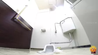 EE-754 01 Hidden camera: women doing urine test in hospital toilet.